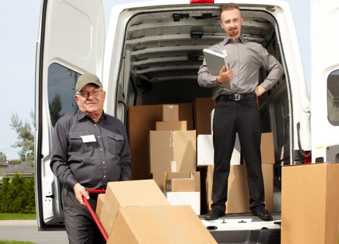 Person using an accessible Man With Van Hatchend website on a laptop