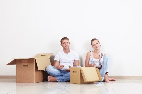 Loading furniture and boxes into a van for a Hatch End move