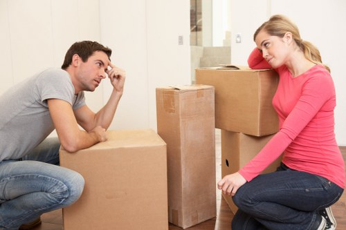 Packed boxes and furniture ready for local removals in Hatch End